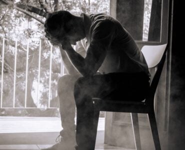 silhouette of man in contemplation